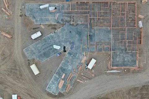 Aerial overhead view of IDOC Re-entry Center foundation and early wood framing layout by BLU-D Commercial Framers