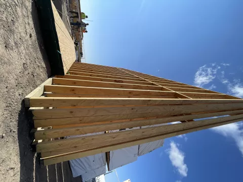 BLU-D framing panelized walls with blue sky at Hibbard Elementary
