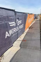 America First Credit Union branded construction fence wrap surrounding the AFCU Rexburg project site