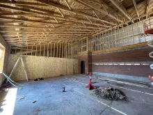 BLU-D framing interior view of sheathed trusses and walls, Hibbard Elementary