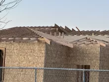 BLU-D Framing ground level view of hip roof trusses on Pocatello Children's Clinic
