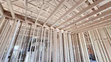 Interior timber framed walls with exposed ceiling joists.